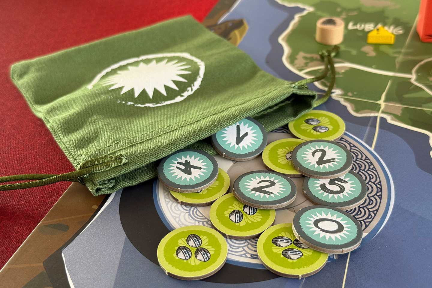 The resolution tokens, with food icons on the back.