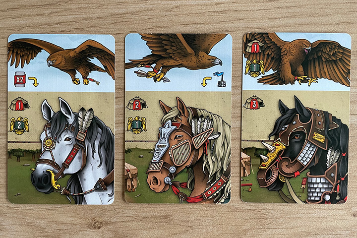 A few examples of animal cards. The left eagle improves a passive ability, the middle one allows an active one to be activated.