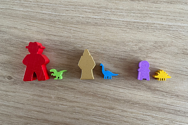 A size comparison of the dinosaur meeples. From left to right: Lost Ruins of Arnak, Dune: Imperium and Hadrian's Wall.