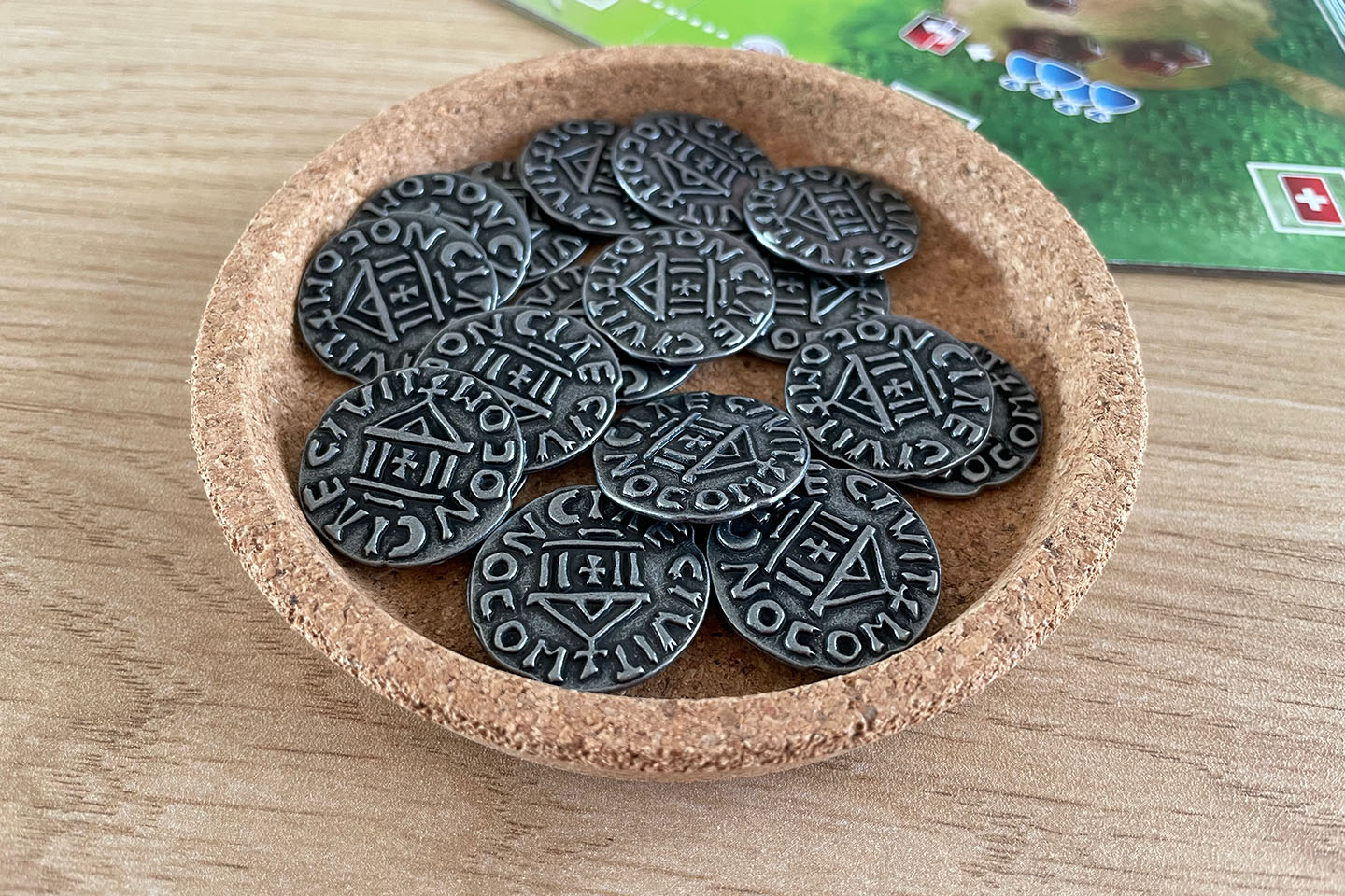 The official metal coins for the West Kingdom games.